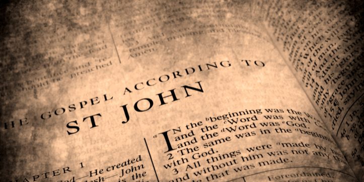 Open pages of bible isolated on white background