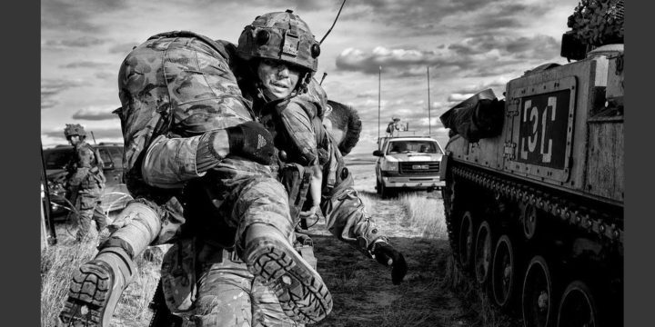 solider carrying another